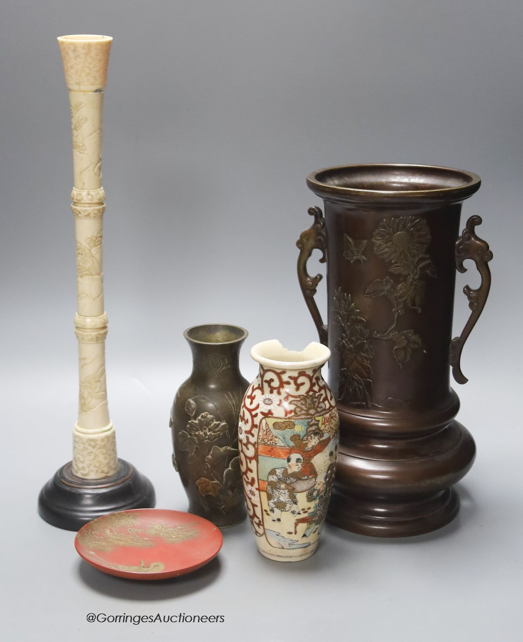 Various Japanese collectables including two bronze vases, a carving, a porcelain vase and a lacquer dish, tallest 27cm